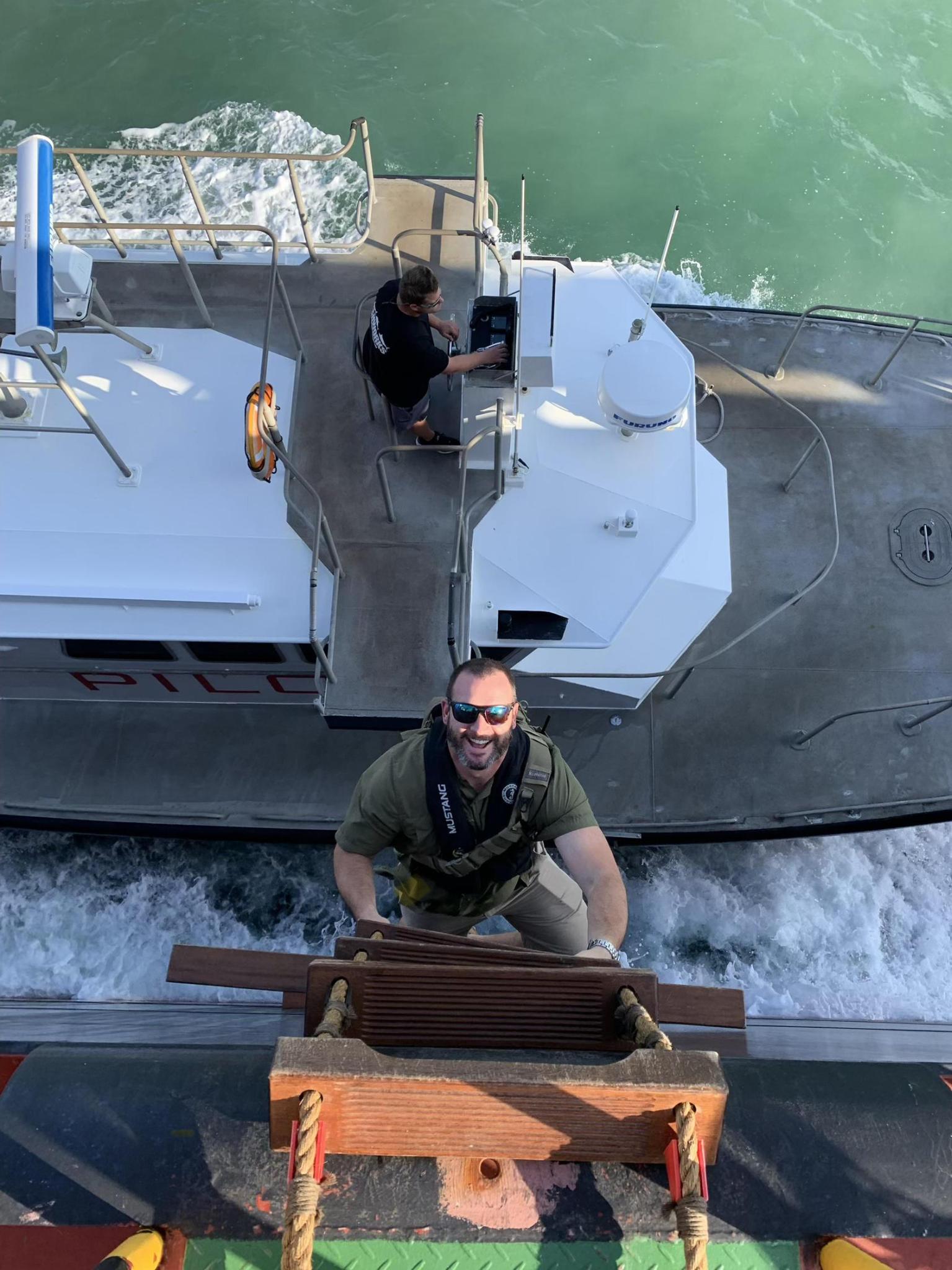 Matthew Lynch boarding a ship as harbor pilot